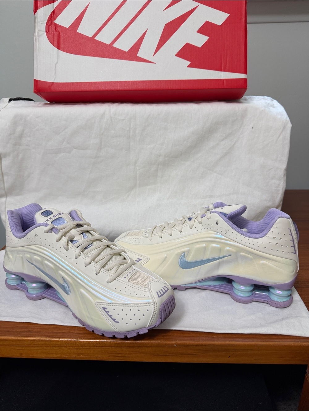 Nike Women’s Shox Sneakers in Cream with Lavender and Light Blue Accents